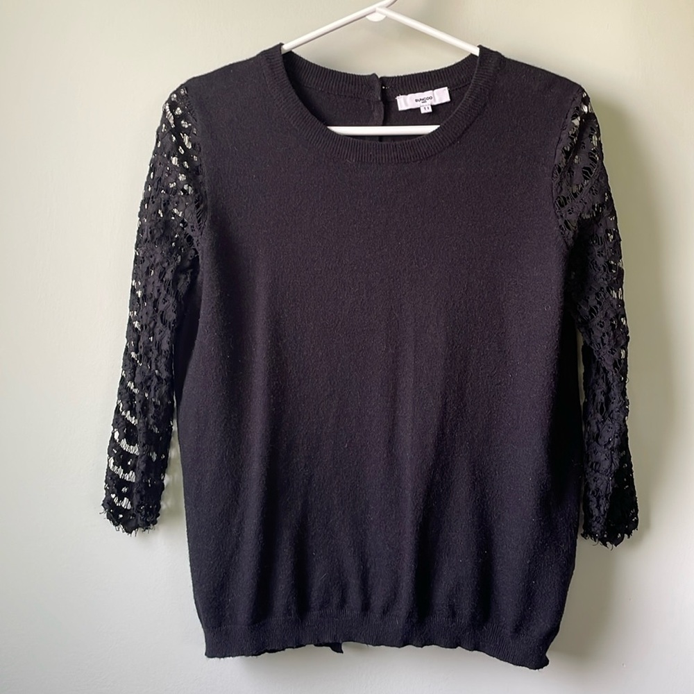 Gorgeous black sweater with lace arms